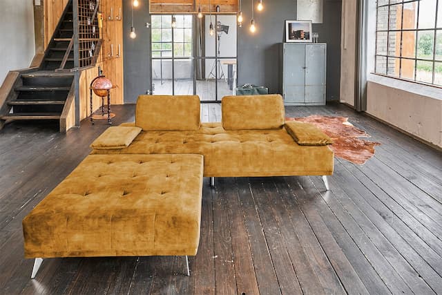 KAWOLA Sofa WIOLO Schlafsofa Daybed mit Hocker velvet cognac